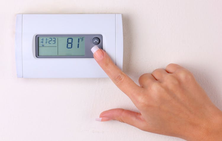 Reducing the temperature on thermostat heating system and wearing an additional layer of clothes instead can save on energy costs as well as reduce energy use.