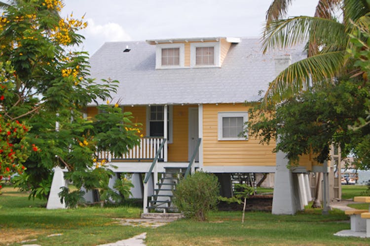 House in the Florida Keys, USA built on stilts to minimize flood damage.